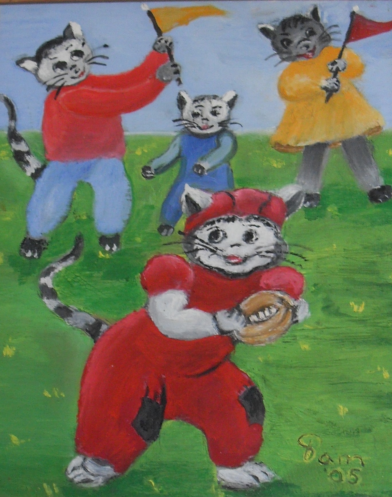 261-Katten met rugbyspel